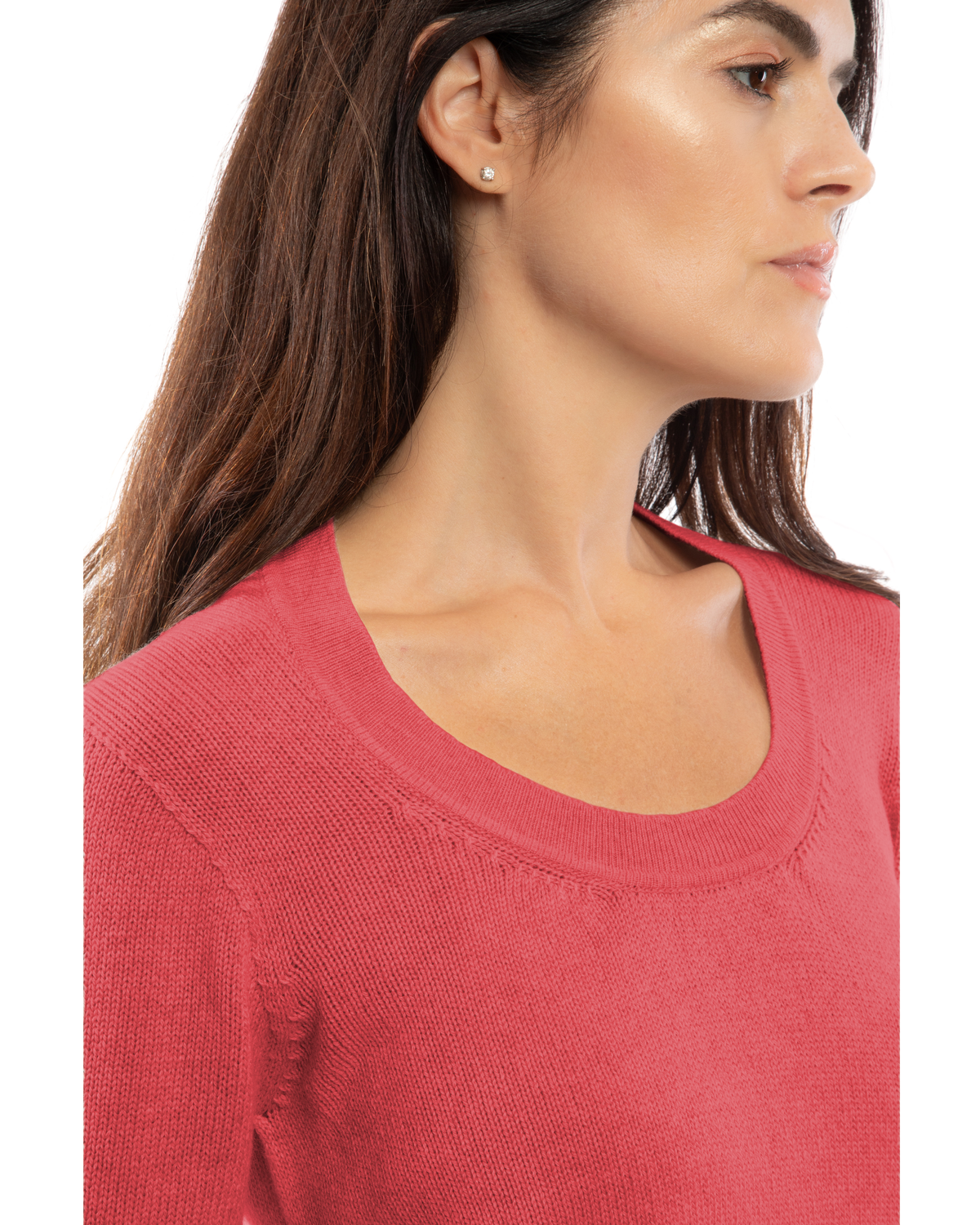 Close-up of coral red cashmere scoop-neck sweater, showing scoop neckline.