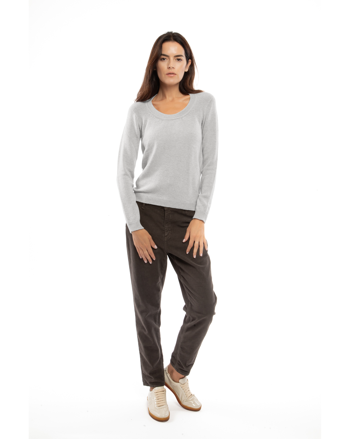 Model wearing the light gray cashmere scoop-neck sweater