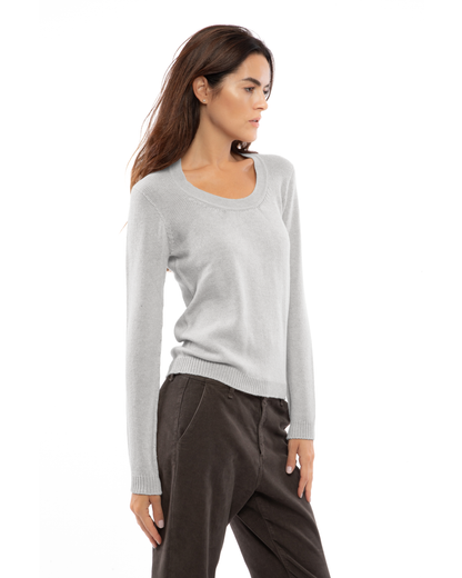 Light gray cashmere scoop neck, three-quarter view on a model