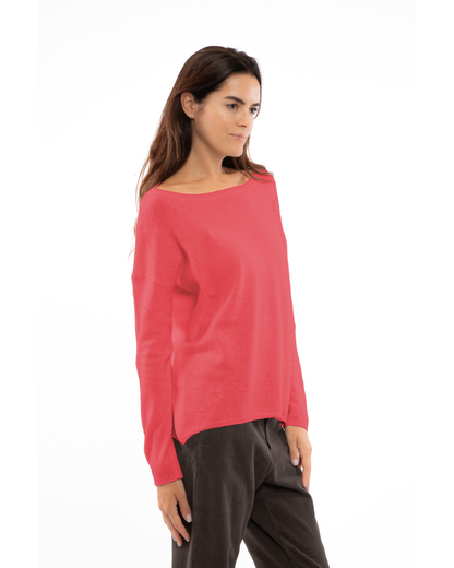 Coral Red oversized pure cashmere boatneck sweater, three-quarter view on a model.