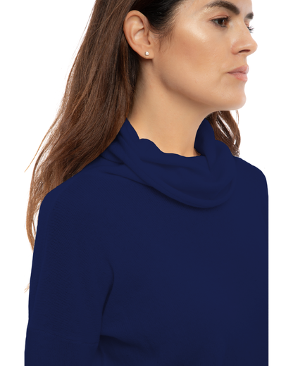Blue oversized pure cashmere cowl-neck sweater, close-up of the draped cowl neckline and cashmere texture.
