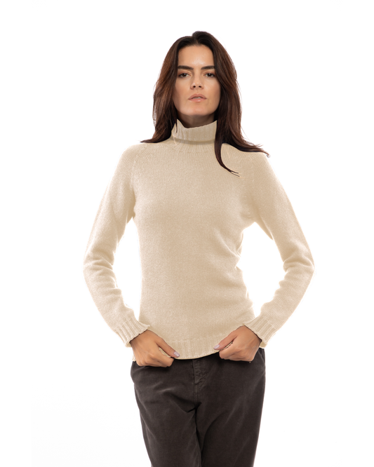 Beige cashmere raglan-sleeve turtleneck sweater, front view on a model.