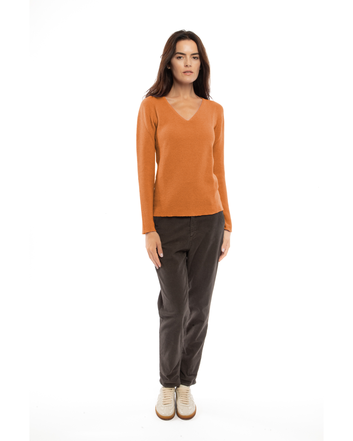Saffron pure cashmere links-stitch V-neck sweater, full-length view on a model.