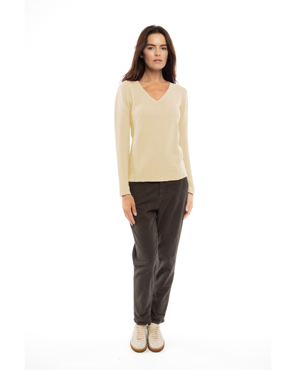 Butter Yellow pure cashmere links-stitch V-neck sweater, full-length view on a model.