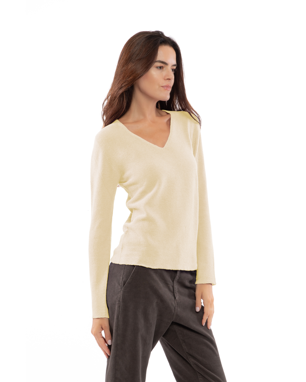 Butter Yellow pure cashmere links-stitch V-neck sweater, three-quarter view on a model.