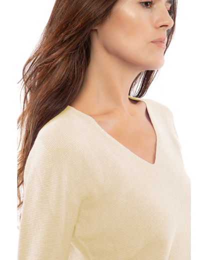Butter Yellow pure cashmere links-stitch V-neck sweater, close-up of the V-neckline and links-stitch texture.