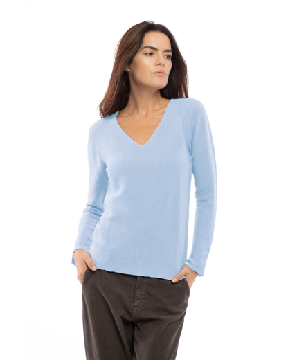 Baby Blue pure cashmere links-stitch V-neck sweater, model view.
