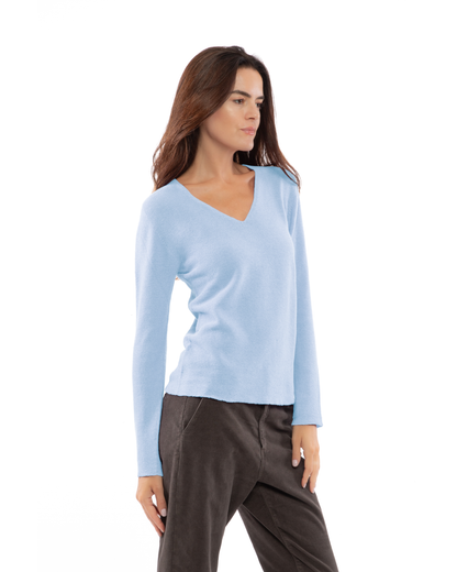Baby Blue pure cashmere links-stitch V-neck sweater, three-quarter view on a model.