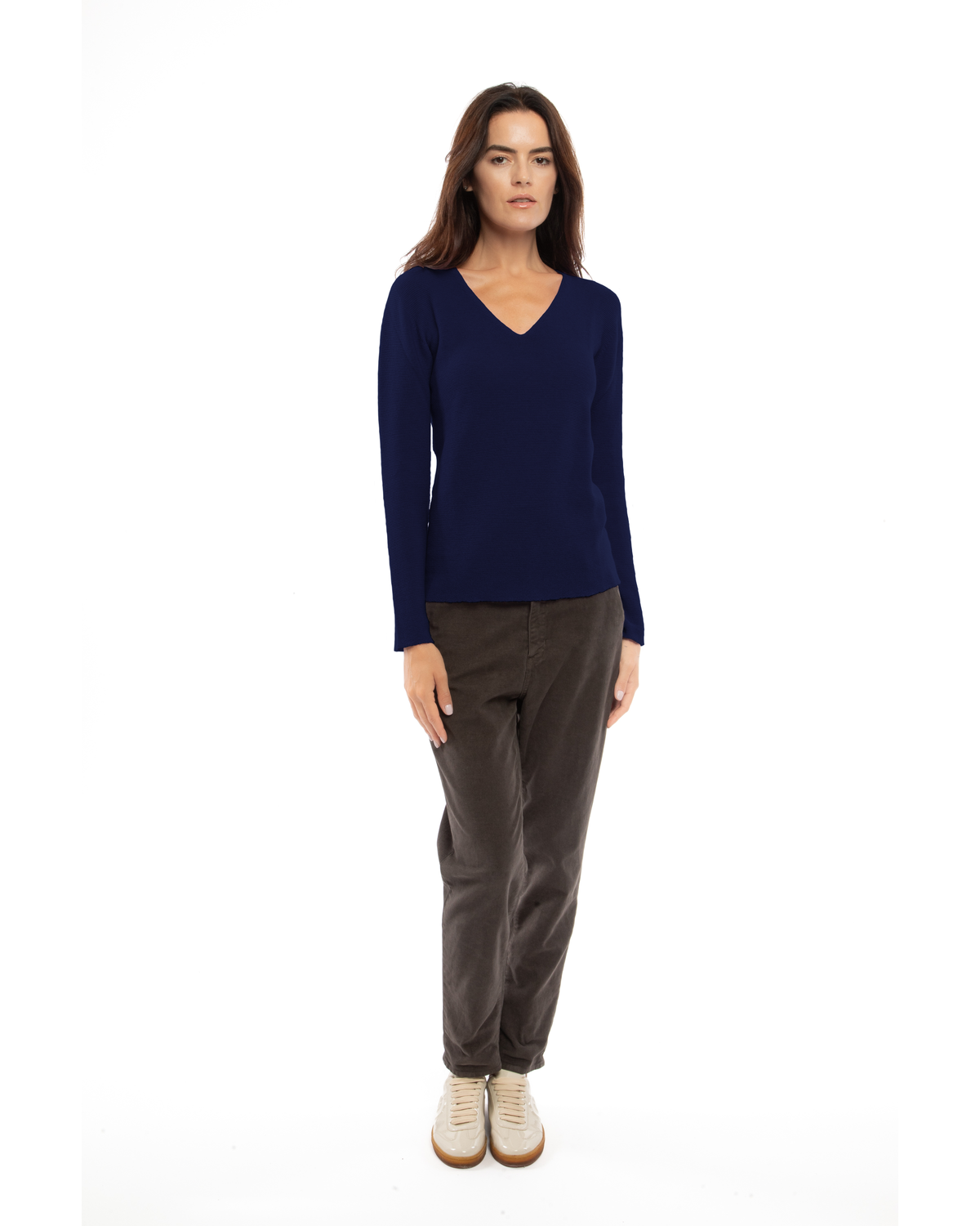 Blue pure cashmere links-stitch V-neck sweater, full-length view on a model.