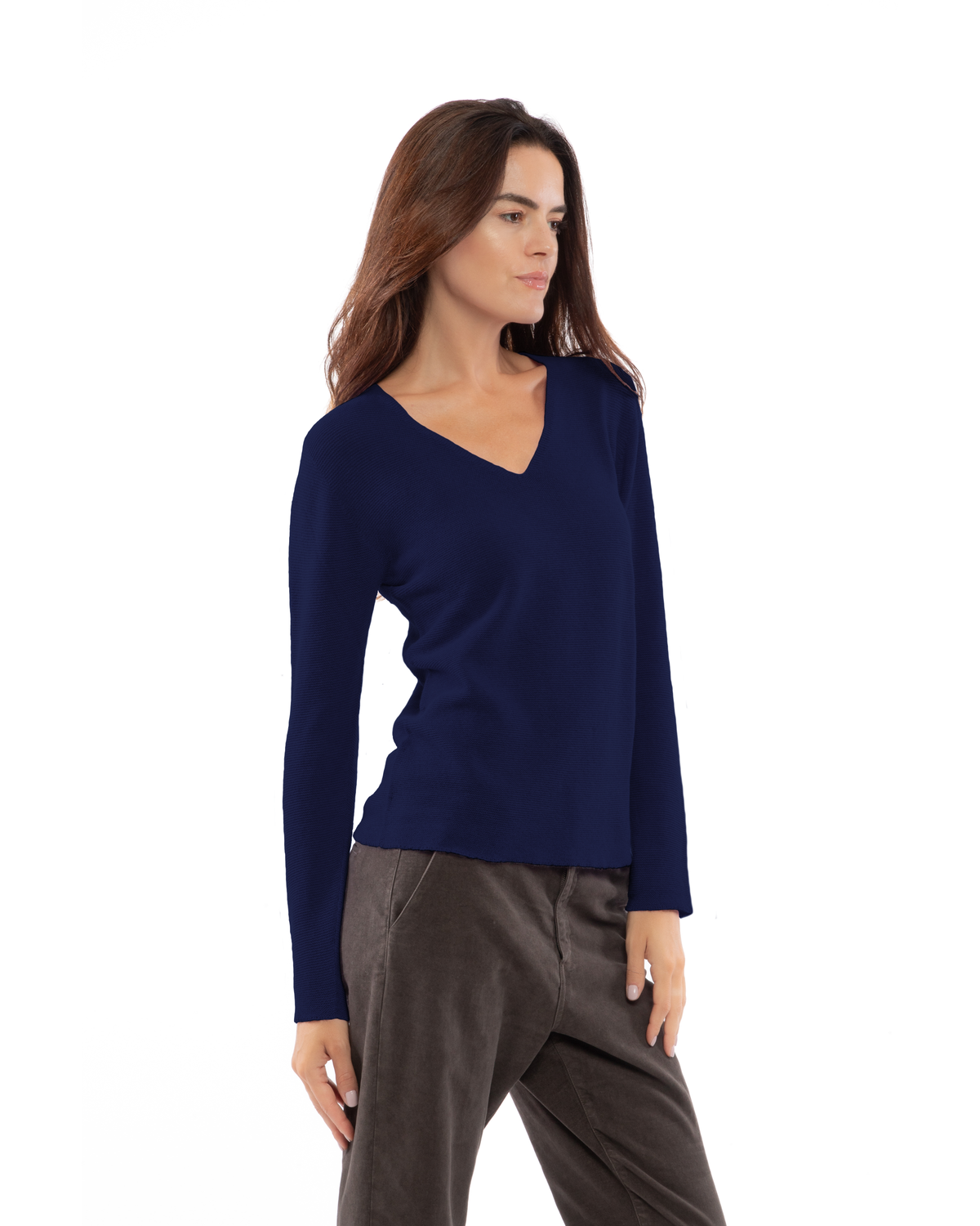 Blue pure cashmere links-stitch V-neck sweater, three-quarter view on a model.