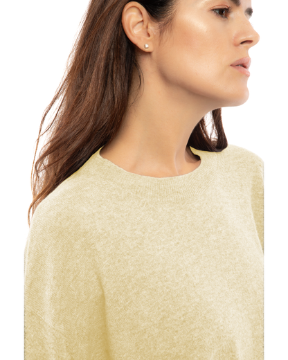 Butter Yellow pure cashmere oversized crewneck sweater, close-up of the crew neckline and knit texture.