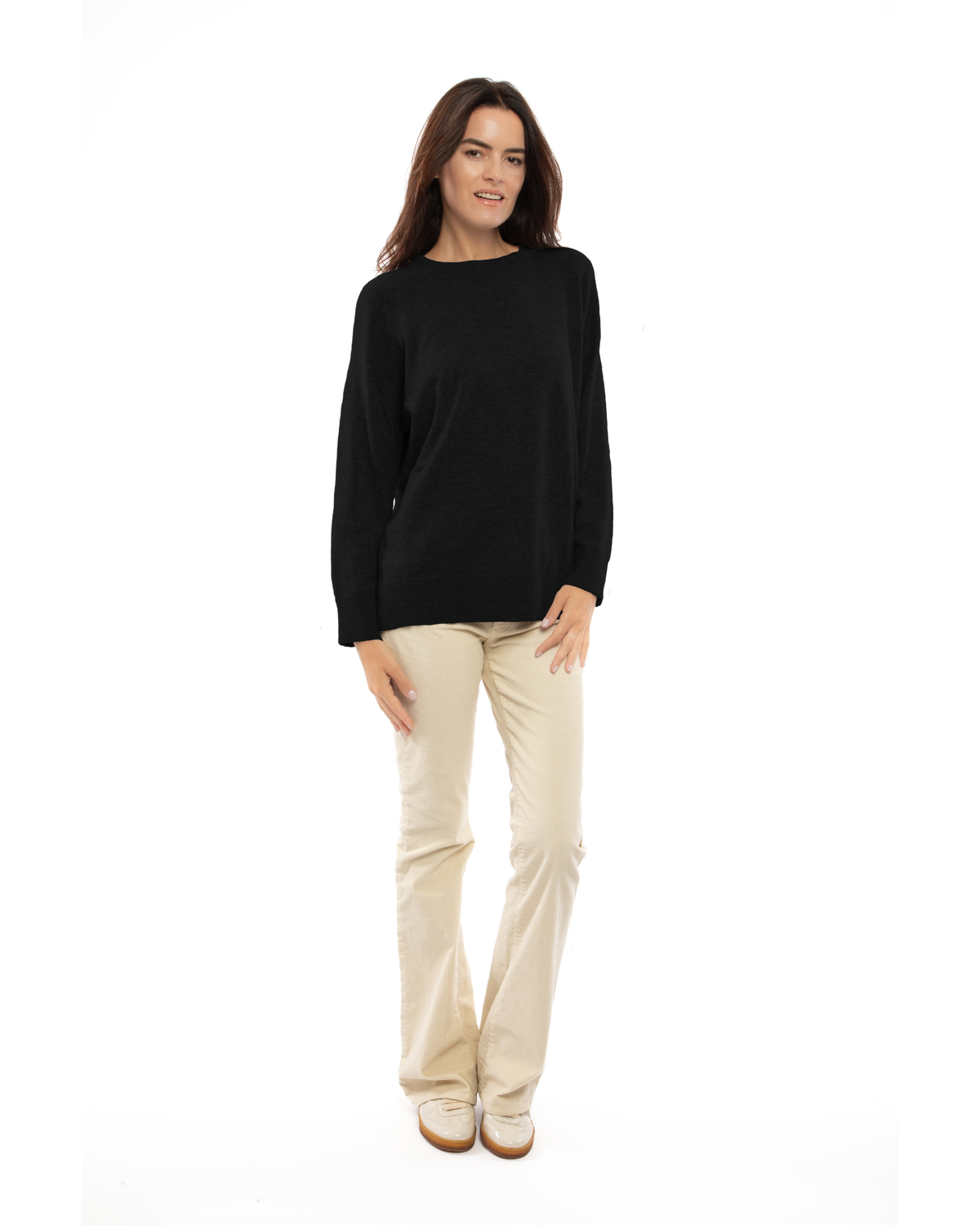 Black pure cashmere oversized crewneck sweater, full-length view on a model.