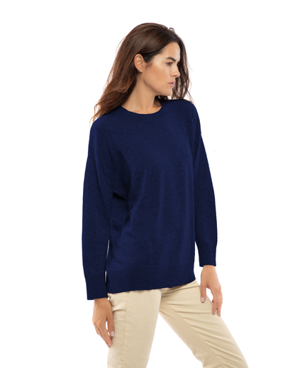 Blue pure cashmere oversized crewneck sweater, three-quarter view on a model.
