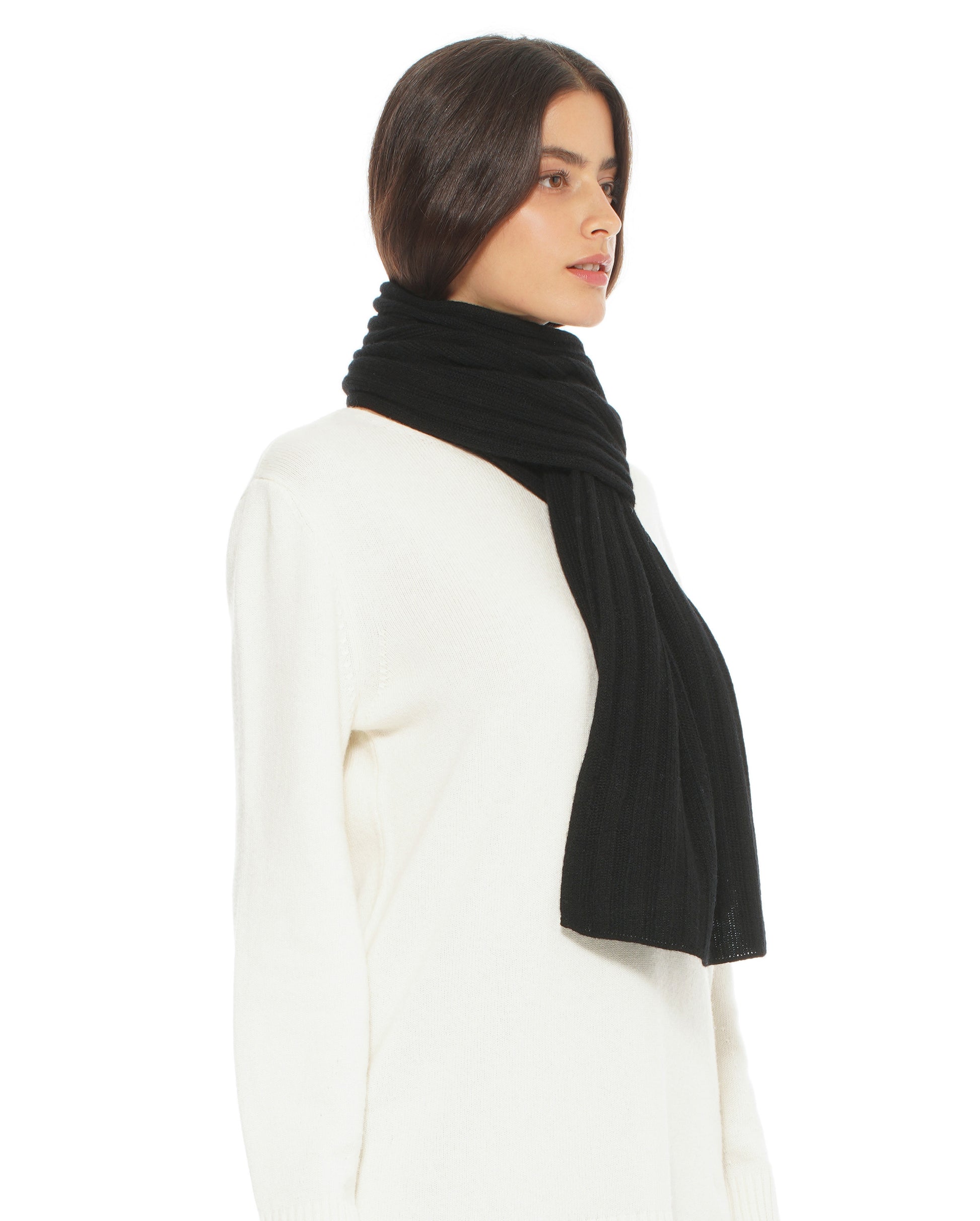 Woman wearing a black scarf on a white background