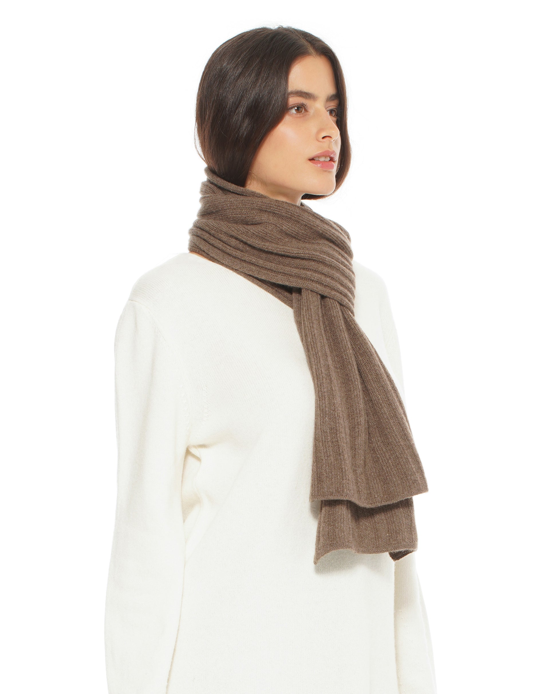 Woman wearing a brown scarf on a white background