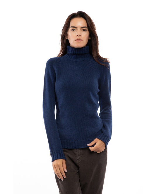 Night blue cashmere raglan sleeve turtleneck sweater, front view on a model.